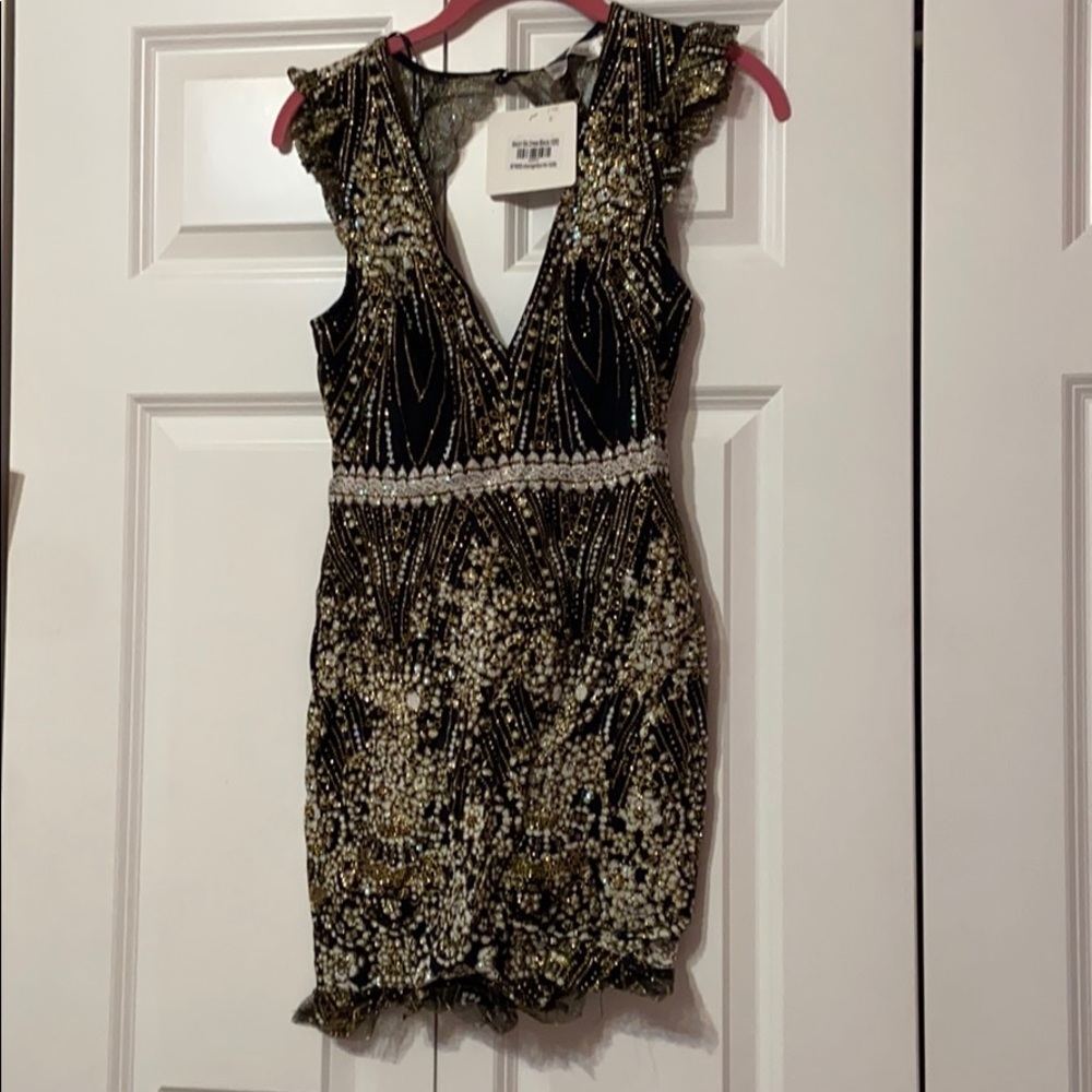 Black and gold sequined dress